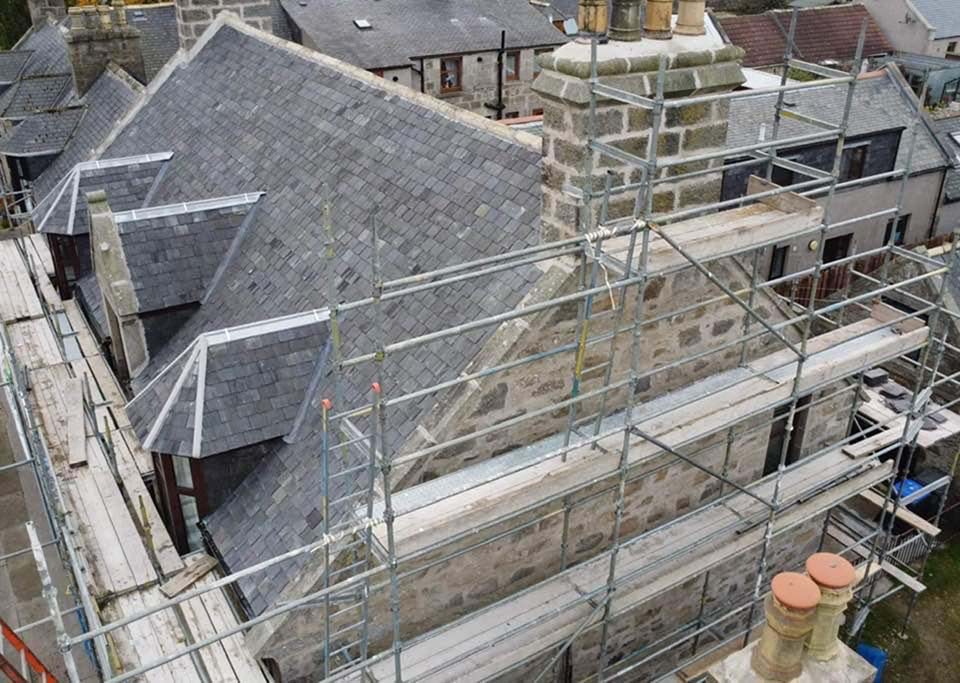 Scaffolding on a house ready to repair the roof